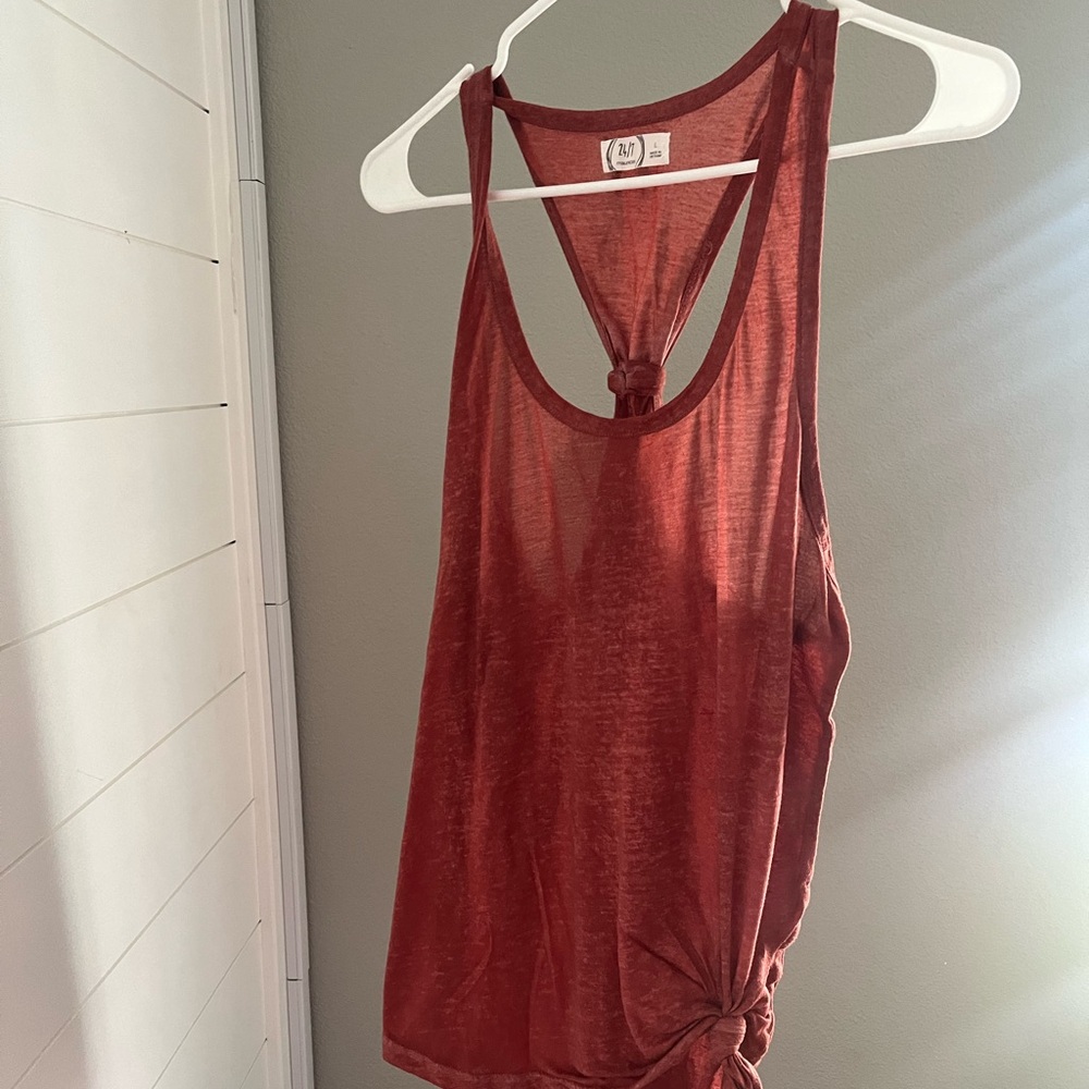 Burnt orange tank top.